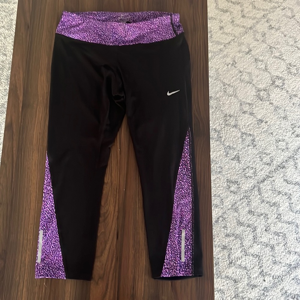Black and purple Nike leggings